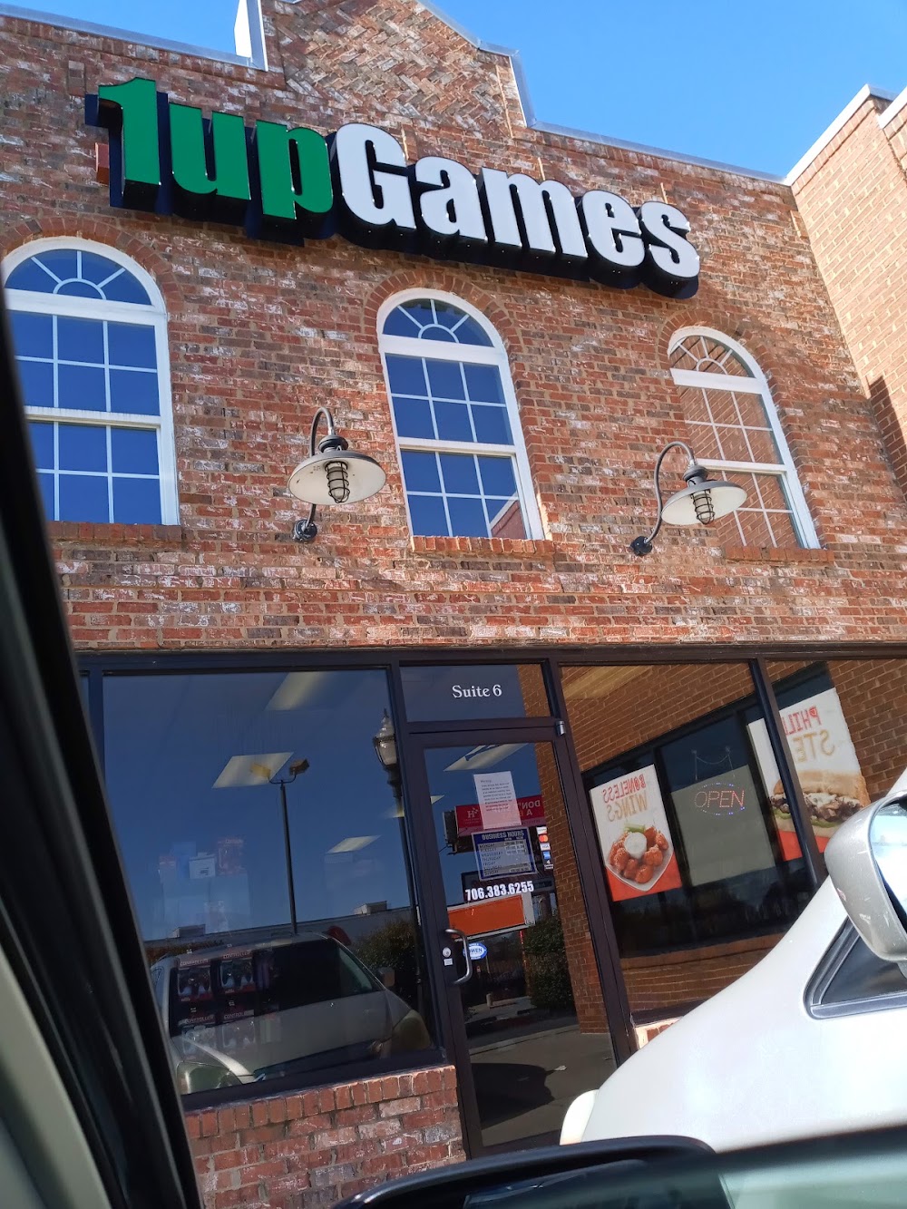 1up Games, tienda de TCG en Calhoun