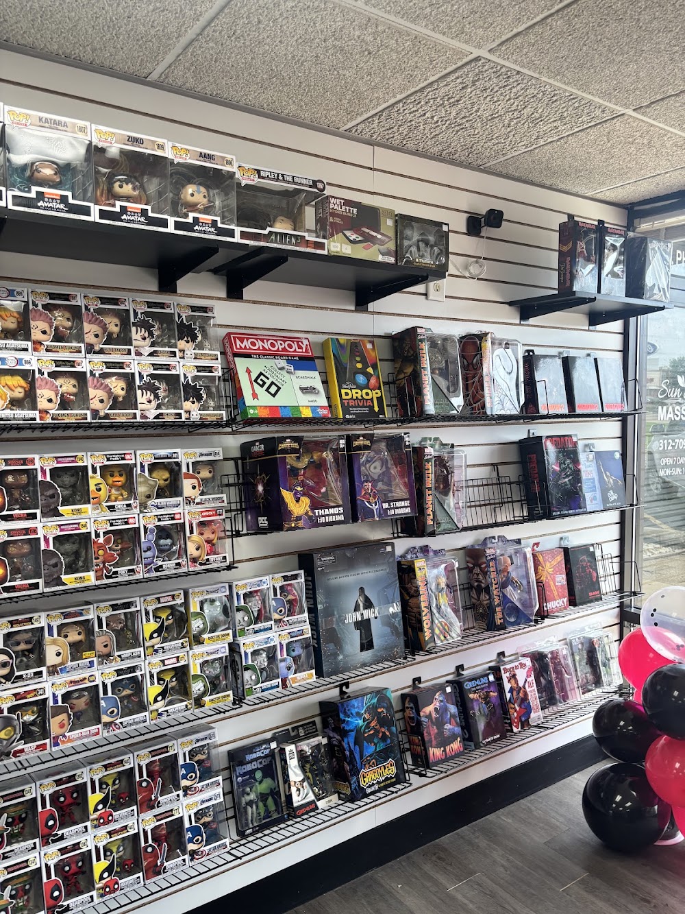 Comics and Coasters, a TCG store in Rockford