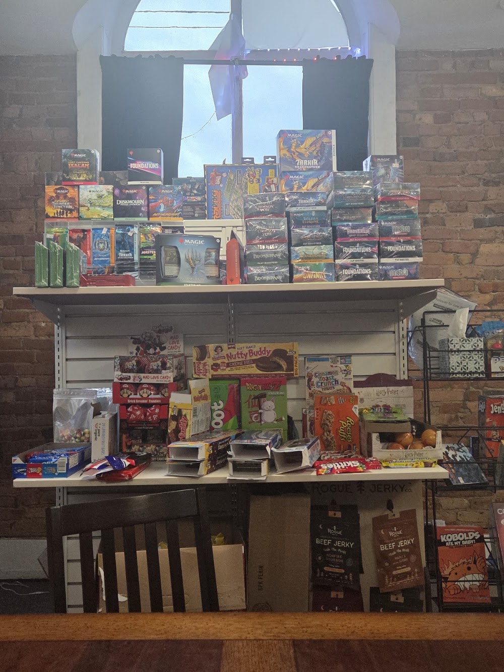 Gamenasium LLC, tienda de TCG en Elbridge