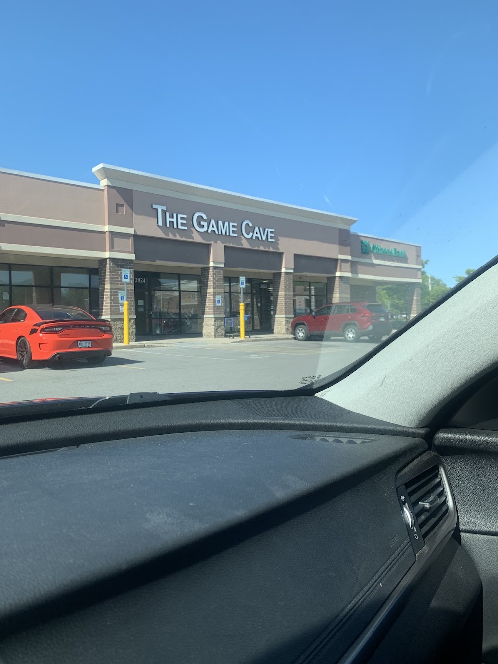 The Game Cave, tienda de TCG en Rochester