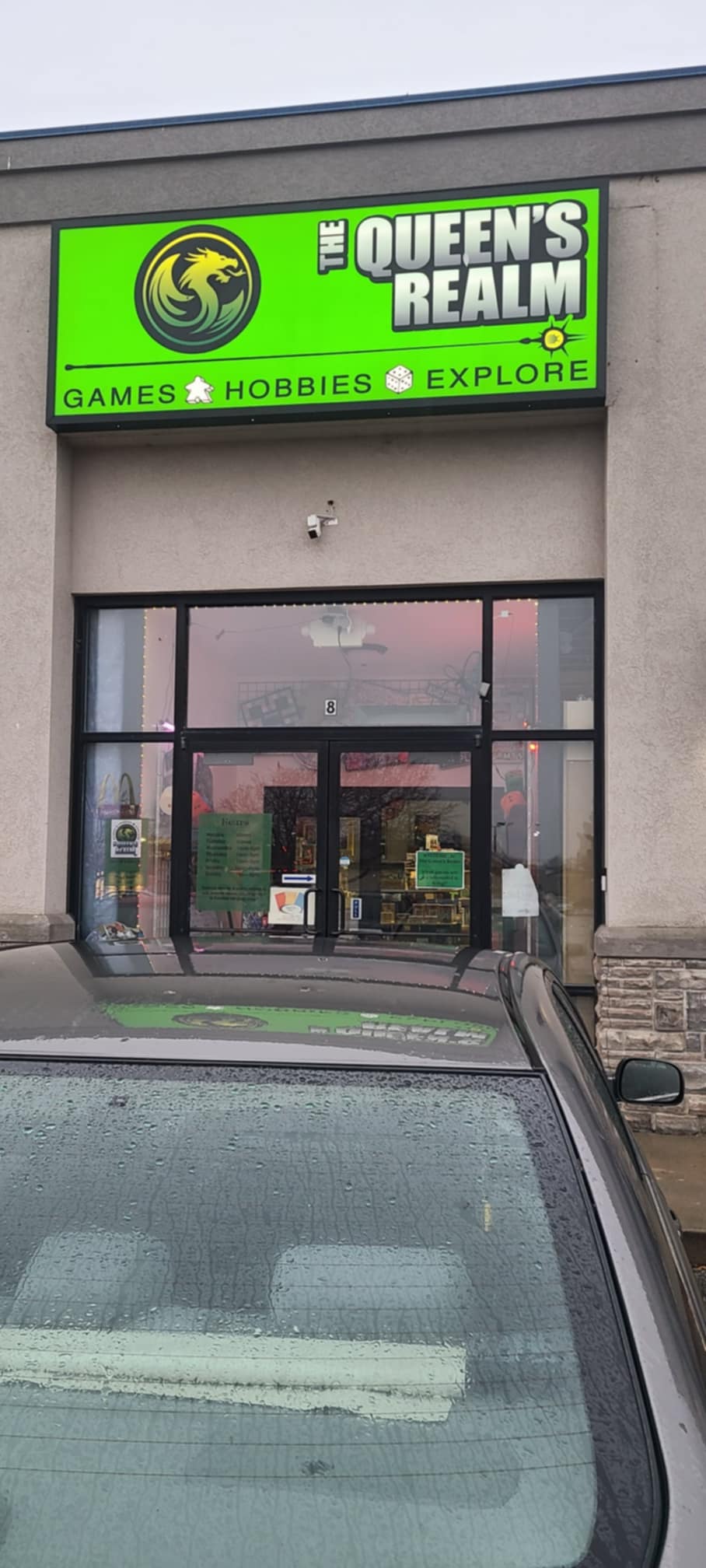 The Queen's Realm, tienda de TCG en Roy