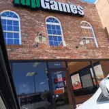 1up Games, tienda de TCG en Calhoun