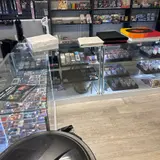 Captivate Cards & Collectibles, tienda de TCG en Aurora