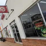 Covert Comics & Collectibles, tienda de TCG en Foley