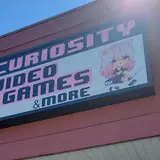 Curiosity Video Games & More, tienda de TCG en Summerfield