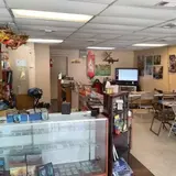 Elder Dragon Games, tienda de TCG en Petal