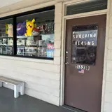 EVOLVING REALMS, tienda de TCG en East Honolulu