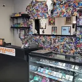Inkwell Tattoo Co and Collectibles, tienda de TCG en Painesville