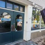 Midcoast Comics, tienda de TCG en Brunswick