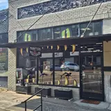 Monsters & Mulligans, tienda de TCG en Brookhaven