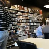Panda's Pair O Dice, tienda de TCG en Gulfport