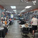 Phoenix Nest Games, tienda de TCG en Athens