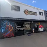 Realms of Magic & Miniatures, tienda de TCG en Kirwan