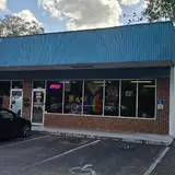 Stomping Grounds Game Center, tienda de TCG en Gainesville