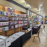 The Collectors Vault at CellCore, tienda de TCG en Bismarck