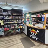 The grand line cafe & games, tienda de TCG en Storm Lake